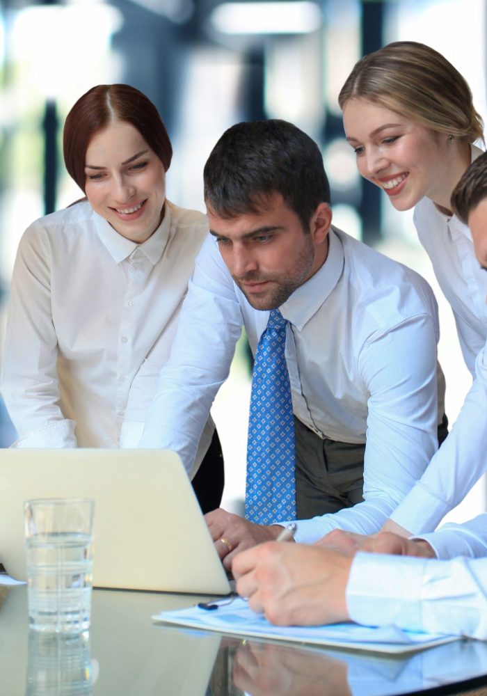 business team working on laptop to check the results of their work. business team working on laptop to check the results of their work