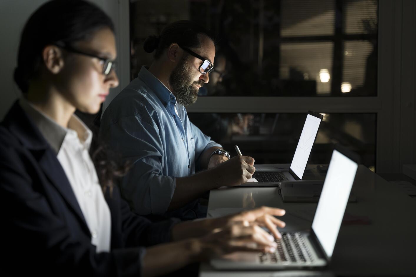 business-teammates-working-late-office business-teammates-working-late-office