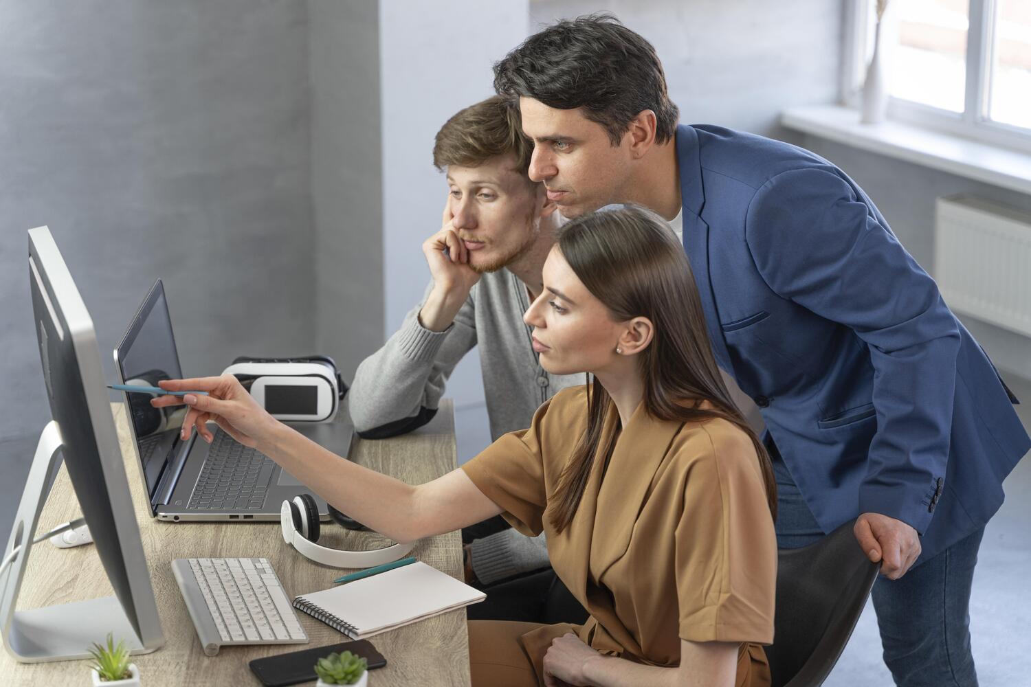 side-view-team-professionals-working-with-new-technology side-view-team-professionals-working-with-new-technology