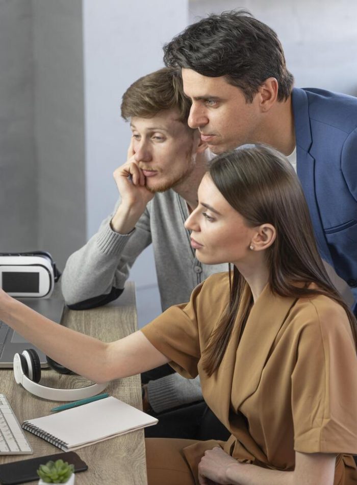 side-view-team-professionals-working-with-new-technology